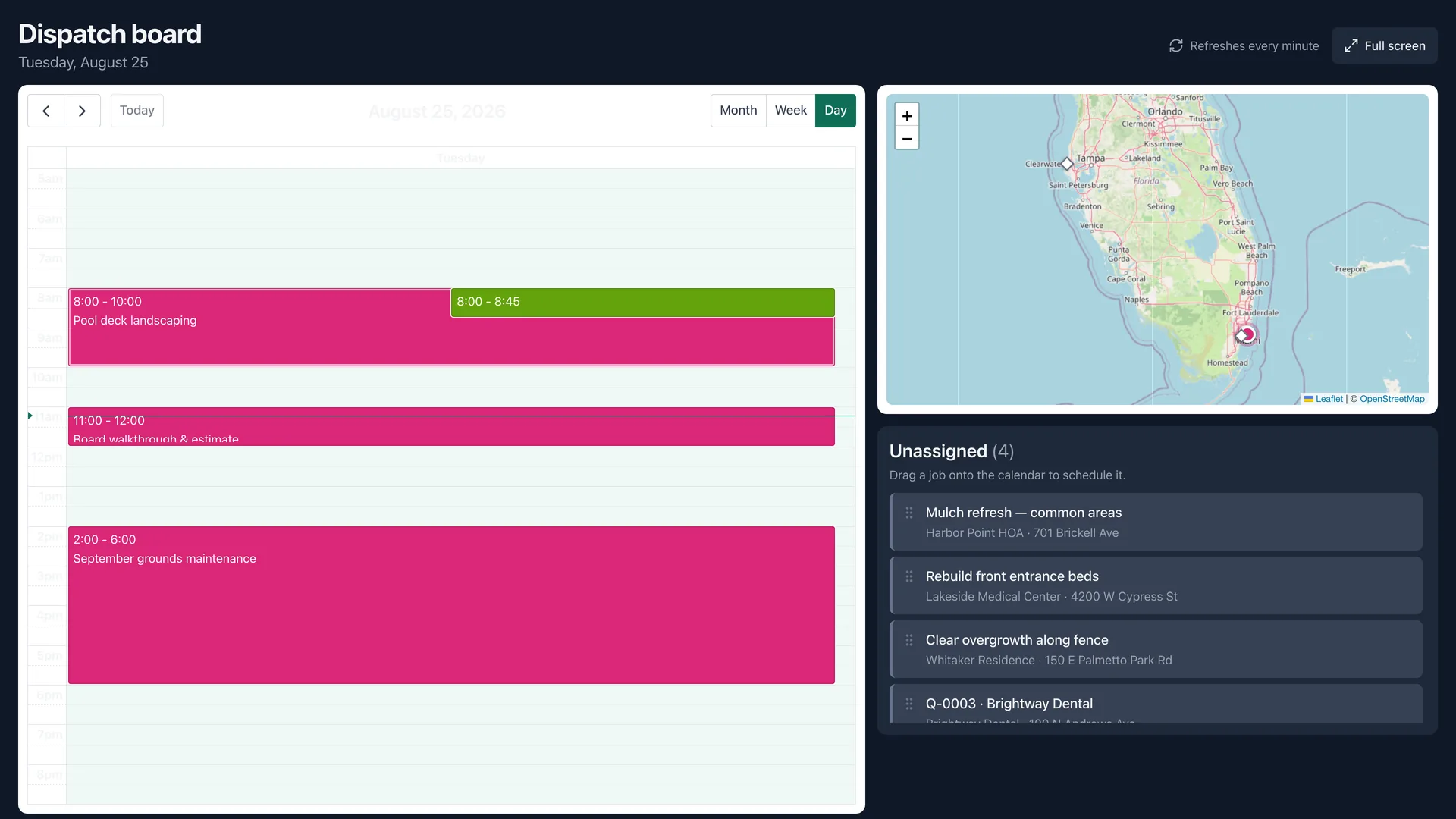 The GreenOps dispatch board on a large screen, with the day's calendar, the crew map and unassigned jobs.